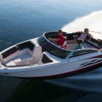 a small boat in a body of water