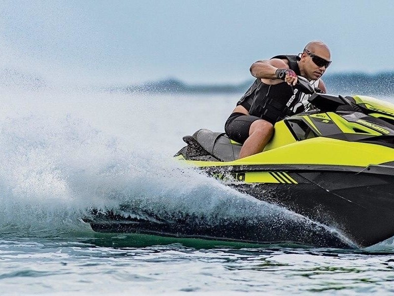a man riding a jet ski in lake tahoe