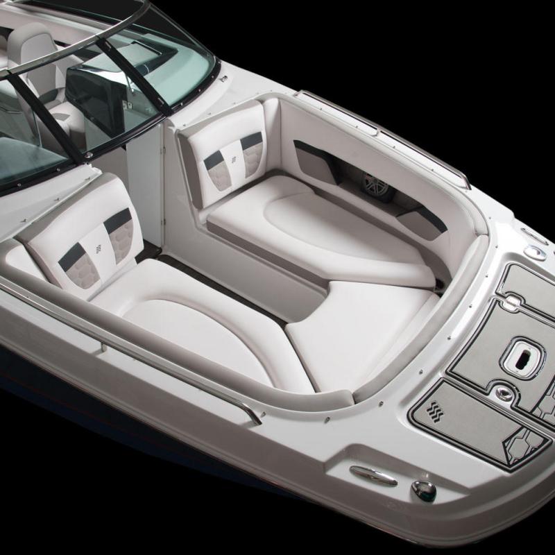 a boat sitting on top of a car