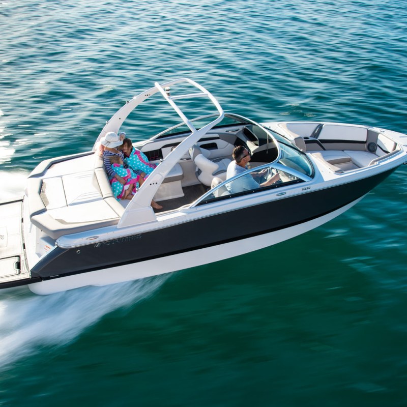 a small boat in a body of water