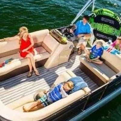 a group of people on a boat in the water