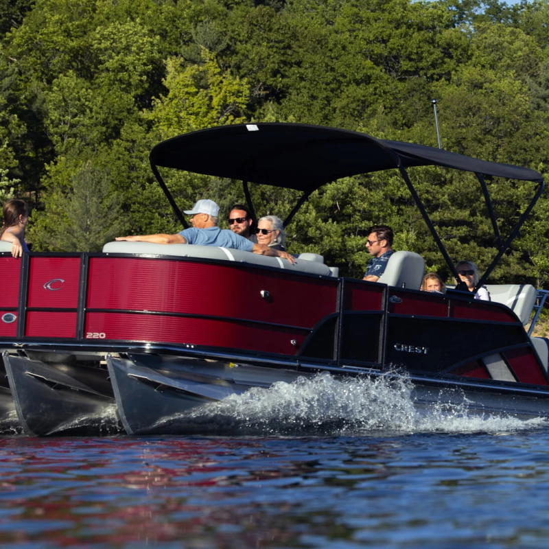 a man riding on the back of a boat