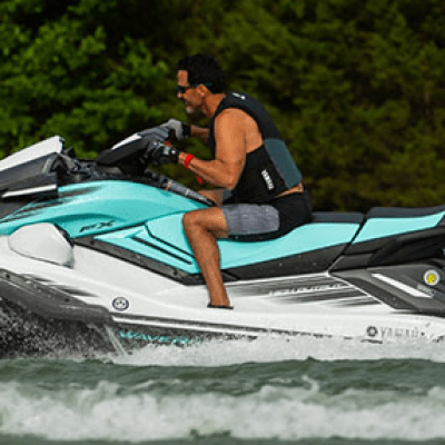 a man riding a wave on a surfboard in the water
