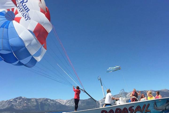 a parachute with a body of water