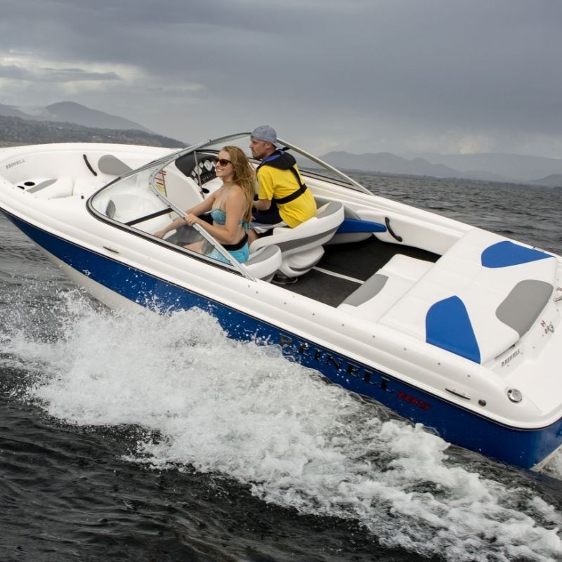 a man riding a wave on a surf board on a body of water