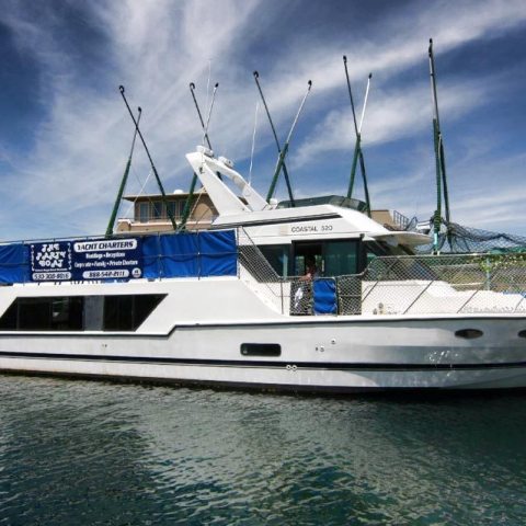 a boat is docked next to a body of water