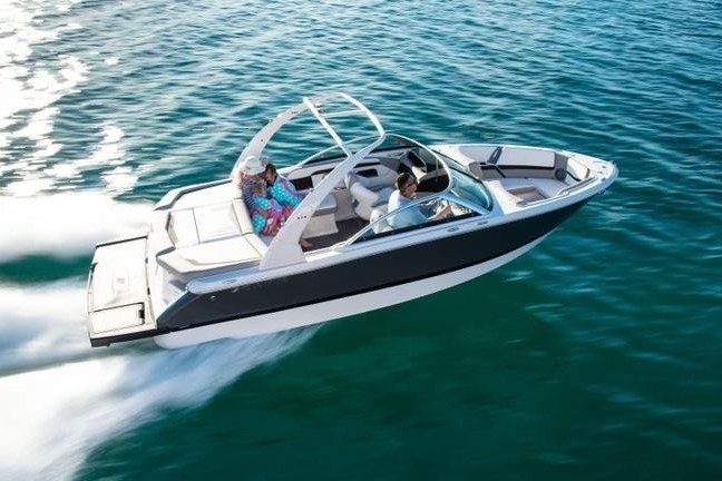 a small boat in a body of water